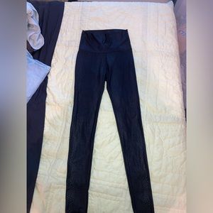 Pink lily snake skin black leggings